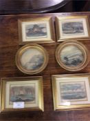Six small oval prints in gilt frames.