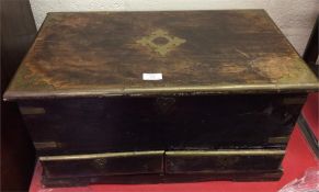 A brass mounted stationery box with gilt drawers.