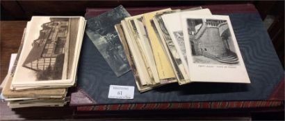 A large collection of old postcards, album etc.