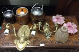 Two brass light fittings together with biscuit bar