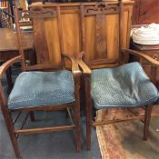 A pair of good oak carver chairs.