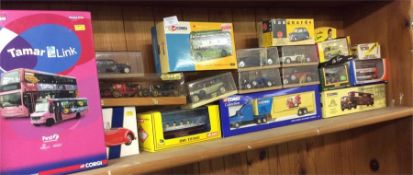 A collection of Corgi buses, lorries and model car