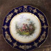 An early gilded plate decorated with a children's