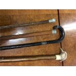 Two silver mounted walking canes etc.