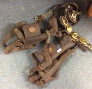 Old leather horse harnesses etc.