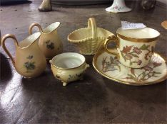A pair of Royal Worcester jugs together with a cof