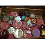 A collection of glass and other paperweights.