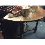 A mahogany drop leaf table.