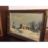 A large gilt framed oil painting of a winter scene