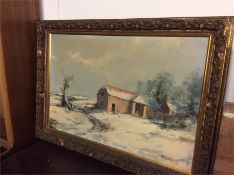 A large gilt framed oil painting of a winter scene