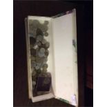 A box containing old coins.