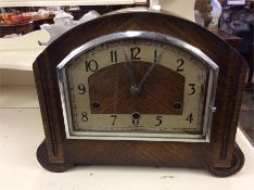 An oak mantle clock.