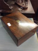 A mahogany and brass mounted writing slope.
