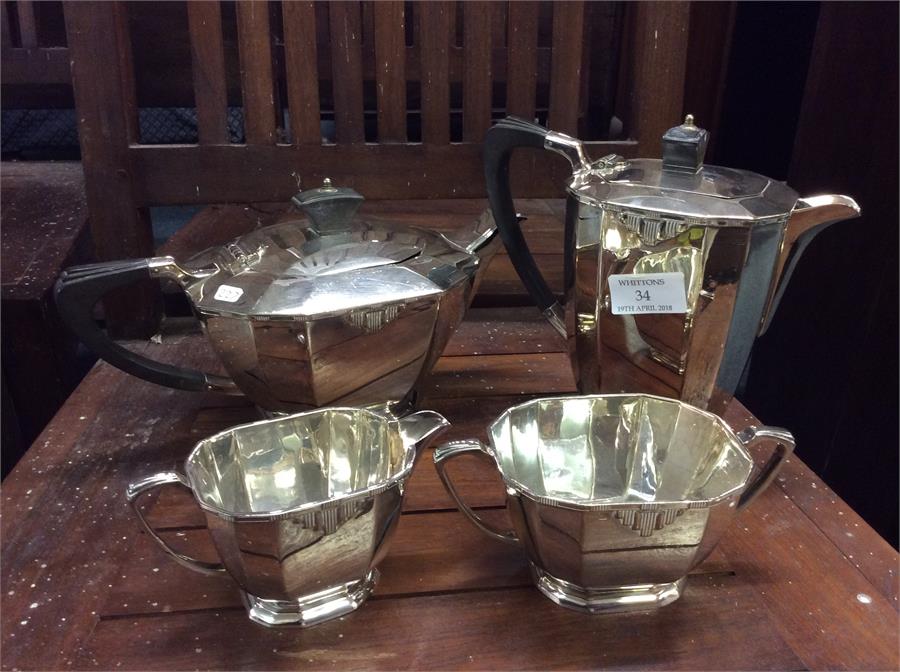 A deco four piece tea set.