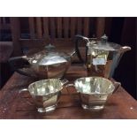 A deco four piece tea set.