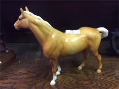 A Beswick horse.