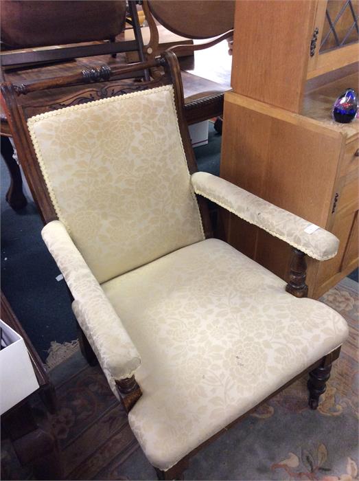 An Edwardian carved nursing chair.