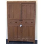 A large tall pine three drawer cupboard of Irish d