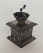 An unusual Continental silver miniature coffee gri