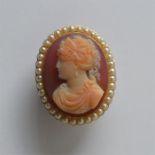 A good oval hard stone cameo of a lady with pearl