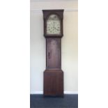 An oak cased grandfather clock with painted dial a