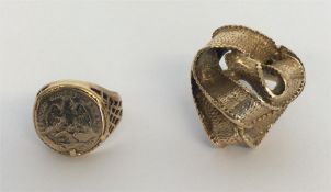 A small gold coin ring together with one other. Ap