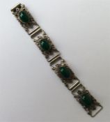 An agate and silver panel bracelet decorated with
