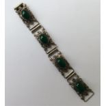 An agate and silver panel bracelet decorated with