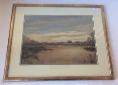 A framed and glazed watercolour of a marshy scene