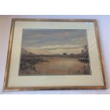 A framed and glazed watercolour of a marshy scene