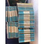 A box containing Pelican books in blue. Est. £15 -