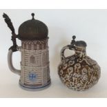 Two Continental pottery Steins with hinged tops. E