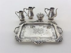 An attractive miniature Continental silver tea service on