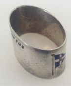 A good silver and enamelled napkin ring decorated