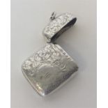 A good large cushion shaped silver vesta case with hinged