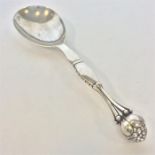 GEORG JENSEN: A large stylish silver spoon with textured