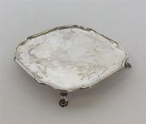 A good small silver waiter on wavy edge. London. By HA. A