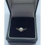 An Antique pearl and diamond seven stone ring in p