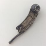 A good silver Bosun's whistle decorated with flowe