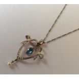 An attractive Edwardian pendant with large central