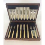 A cased set of 8 + 8 silver fish knives and forks. Sheffi