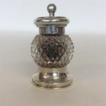 A good cut glass and silver mounted pepper grinder