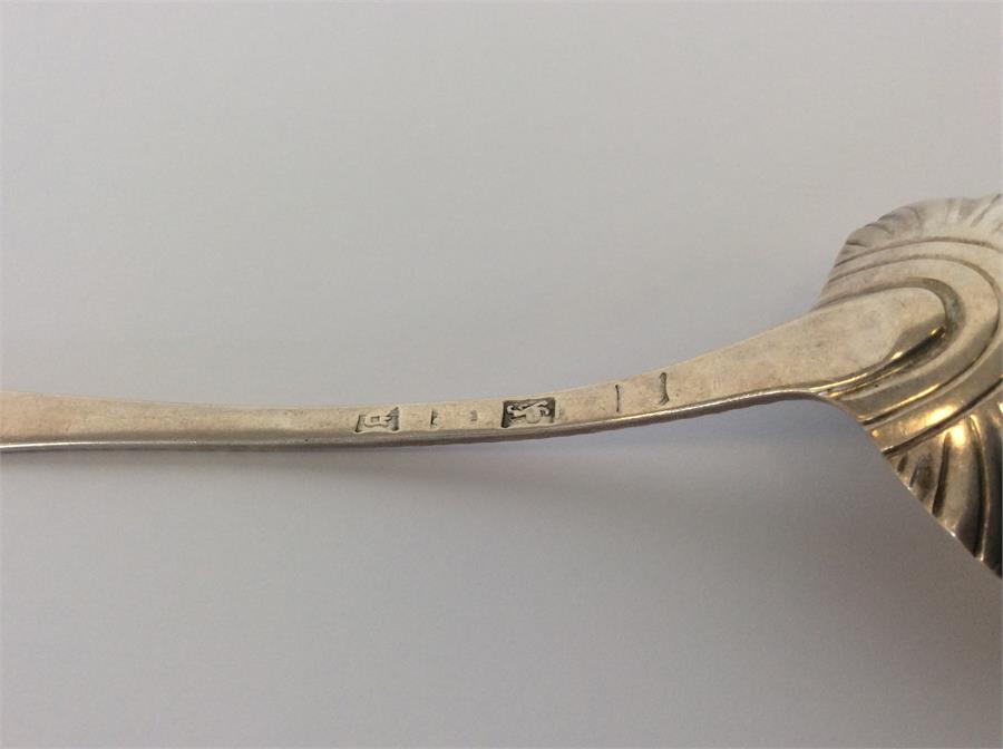 An early Georgian silver ladle with fluted bowl an - Image 2 of 2