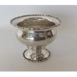 A small modern silver sugar bowl with fancy rim. Chester.