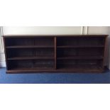 A massive mahogany bookcase on pedestal base. Appr