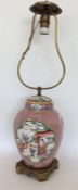 A large Oriental style ginger jar on brass stand. The va