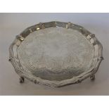 A good quality in-date Victorian silver waiter on ball an