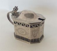 A Victorian bright cut silver mustard pot with pierced de