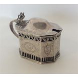 A Victorian bright cut silver mustard pot with pierced de