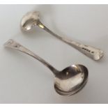 A pair of OE silver sauce ladles with crested armo